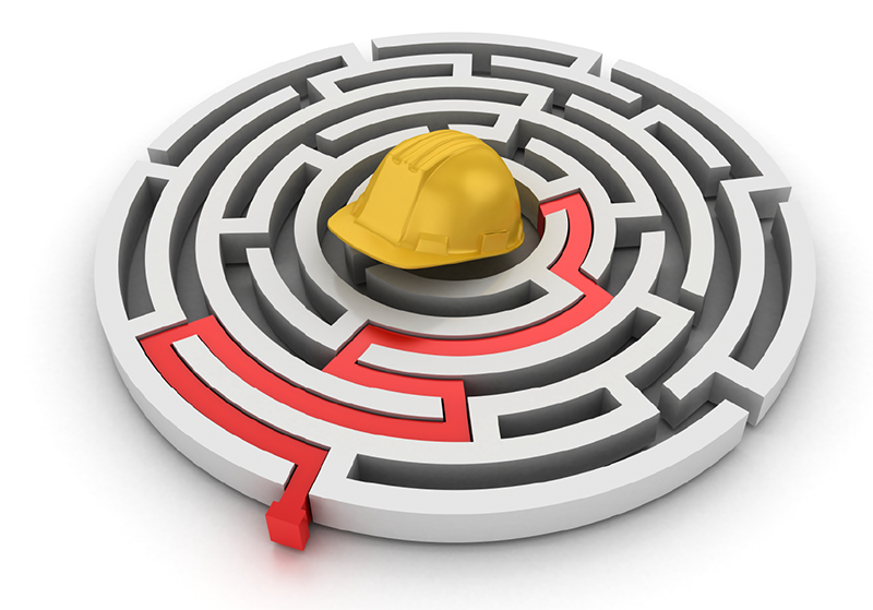 A maze, with a hard hat at the center