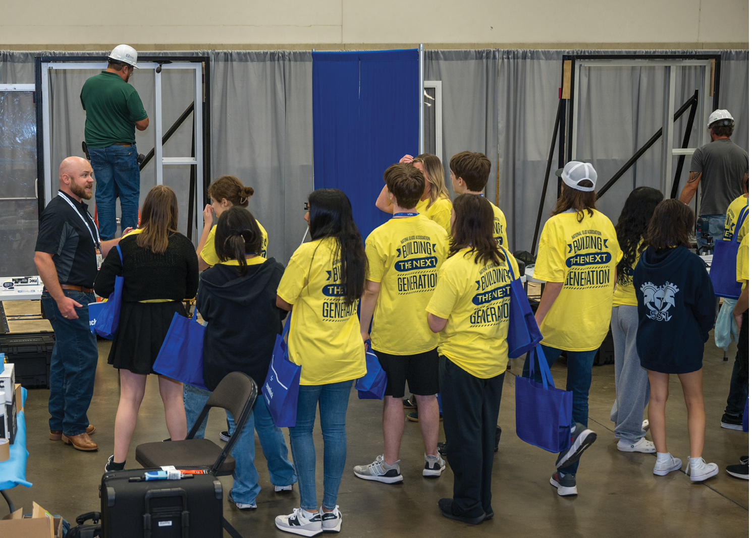 students observe certification testing at GlassBuild